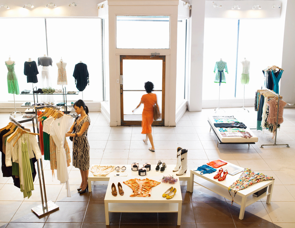 Female shoppers shopping in retail boutique